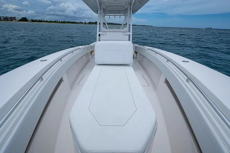 Slide: The Image of 2018 Invincible 33 Open Fisherman boat on calm ocean waters. - 21