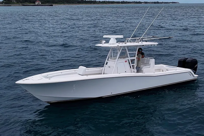 Slide: The Image of 2018 Invincible 33 Open Fisherman boat on open water, side view. - 4