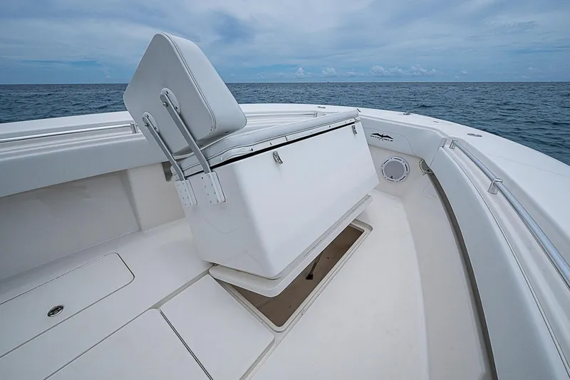 Slide: The Image of 2018 Invincible 33 Open Fisherman boat interior with seating and ocean view. - 19