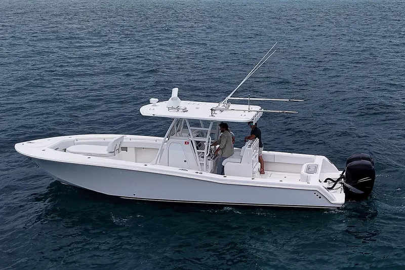 Slide: The Image of 2018 Invincible 33 Open Fisherman boat on open water, side view. - 5
