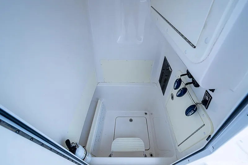 Slide: The Image of Interior view of 2018 Invincible 33 Open Fisherman boat's storage compartment. - 33