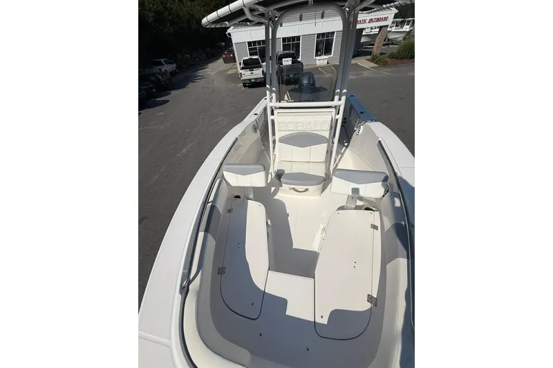 Slide: The Image of 2022 Robalo R200 Center Console boat with spacious seating and sleek design. - 17