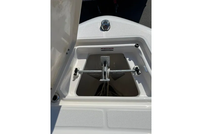 Slide: The Image of Anchor storage compartment on 2022 Robalo R200 Center Console boat. - 22
