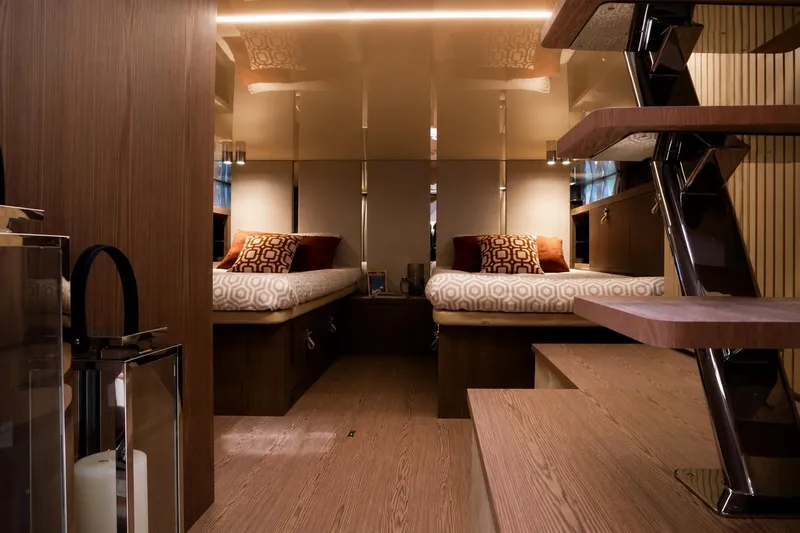 Slide: The Image of Luxurious interior of 2025 Invictus 470 yacht with elegant wooden finishes and modern design. - 6