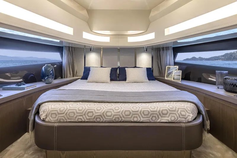 Slide: The Image of Luxurious interior of 2025 Invictus 470 yacht with elegant bedroom design. - 7