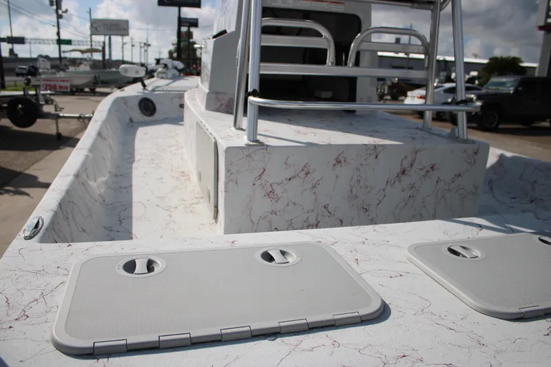 Slide: The Image of 2022 Shoalwater 20' Catamaran with marbled deck and storage compartments. - 11
