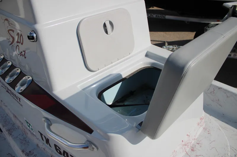 Slide: The Image of 2022 Shoalwater 20' Catamaran with open storage compartment and seating detail. - 12
