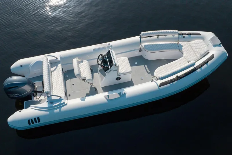 The Image of Manufacturer Provided Image: Novurania Como 24 boat, model year 2026, on calm water. - 0
