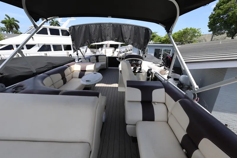 Slide: The Image of Luxurious 2021 Lexington 525 Series 5 boat interior with spacious seating and elegant design. - 20