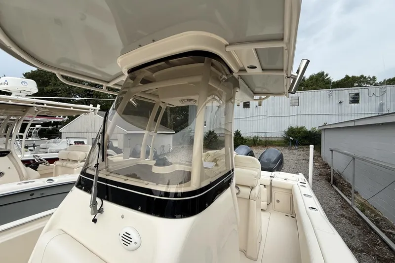 Slide: The Image of 2020 Grady-White Fisherman 257 boat with center console and dual engines. - 11
