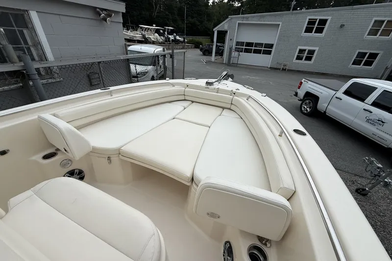 Slide: The Image of 2020 Grady-White Fisherman 257 boat with spacious seating in a marina setting. - 8