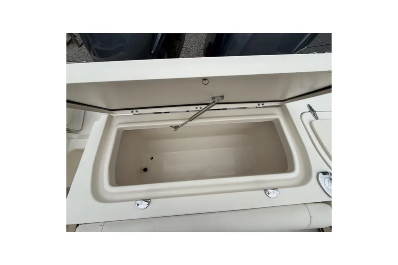 Slide: The Image of Open storage compartment on a 2020 Grady-White Fisherman 257 boat. - 14