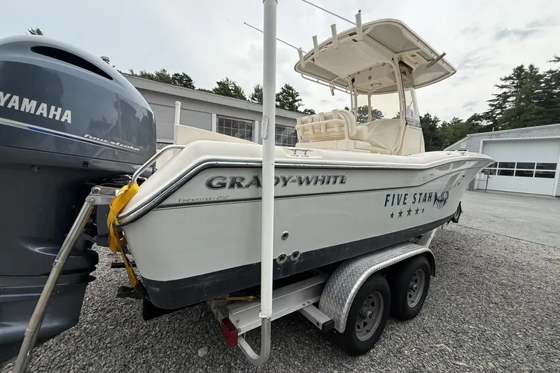Slide: The Image of 2020 Grady-White Fisherman 257 boat on trailer, Yamaha engine, outdoor setting. - 32