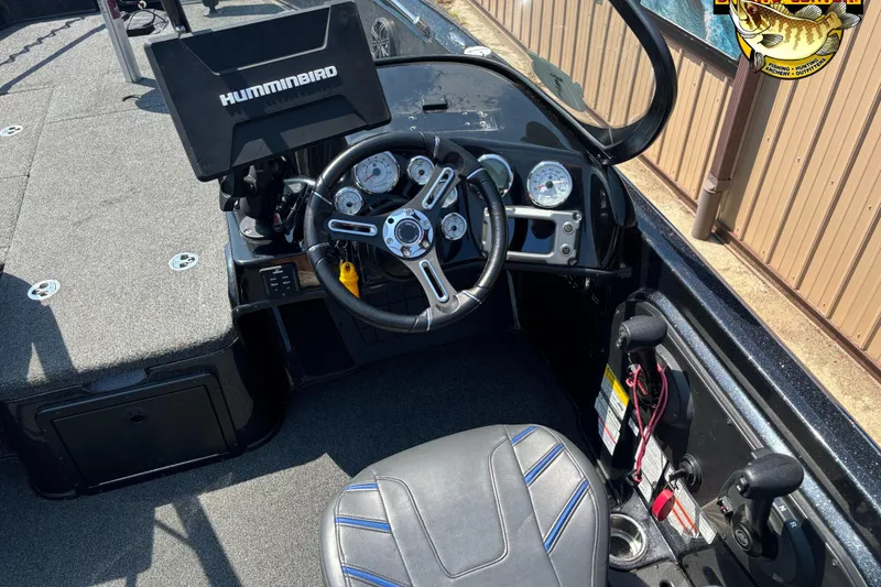 Slide: The Image of Cockpit of 2020 Nitro ZV21 Pro boat with steering wheel and Humminbird display. - 8