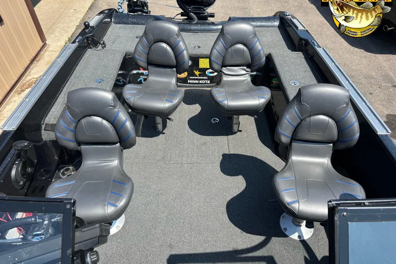 Slide: The Image of Interior of 2020 Nitro ZV21 Pro boat with four cushioned seats and carpeted flooring. - 11