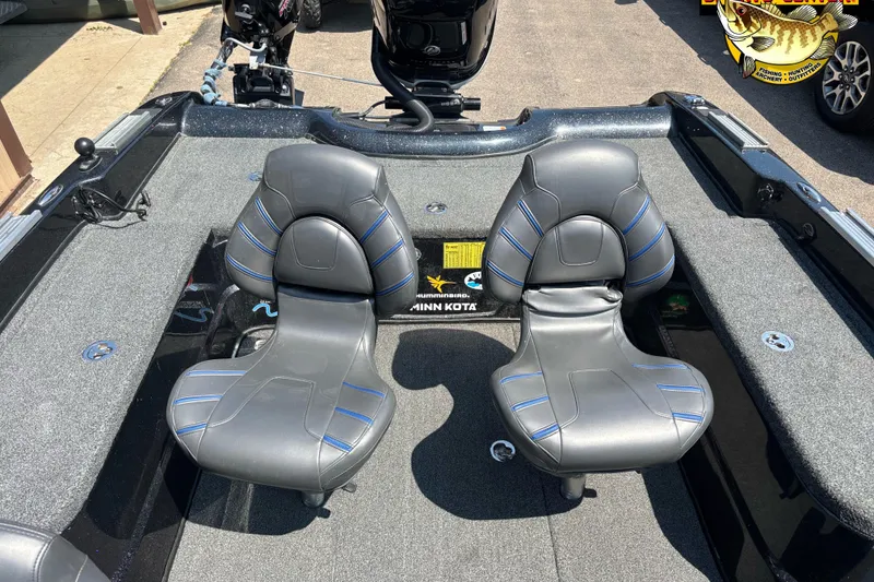 Slide: The Image of Two black and blue seats on a 2020 Nitro ZV21 Pro boat deck. - 6