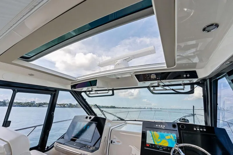 Slide: The Image of Interior view of 2024 Boston Whaler 405 Conquest yacht with advanced navigation systems. - 30