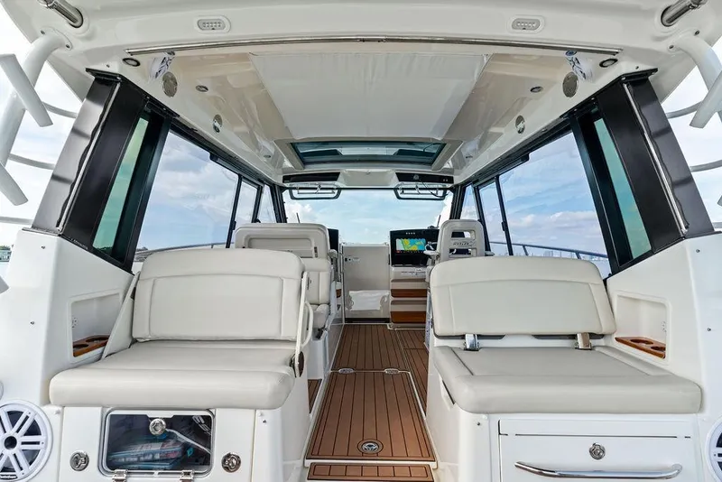 Slide: The Image of Interior view of 2024 Boston Whaler 405 Conquest boat, featuring luxurious seating and modern design. - 38