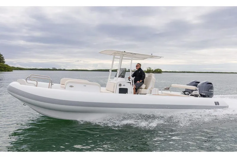 Slide: The Image of Manufacturer Provided Image: 2026 Novurania Catamaran 28 cruising on calm waters. - 3