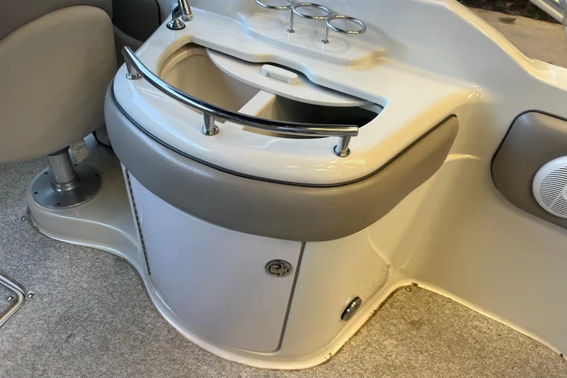 Slide: The Image of Interior of 2004 Sea Ray 270 Sundeck boat with seating and storage area. - 16