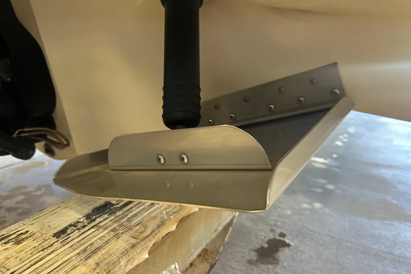 Slide: The Image of Trim tab on a 2004 Sea Ray 270 Sundeck boat, close-up view. - 8