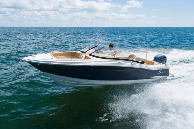Slide: The Image of Manufacturer Provided Image: 2025 Scout 215 Dorado boat cruising on open water. - 15