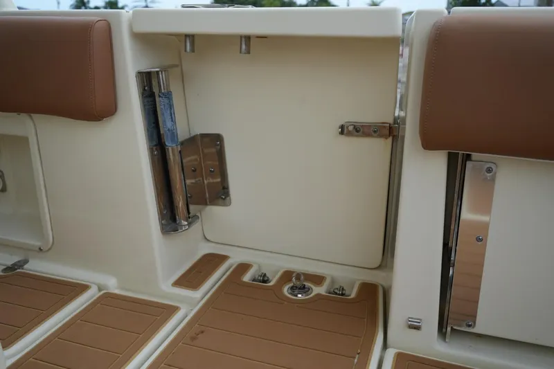 Slide: The Image of 2016 Chris-Craft Catalina 34 interior detail with tan seating and deck. - 46