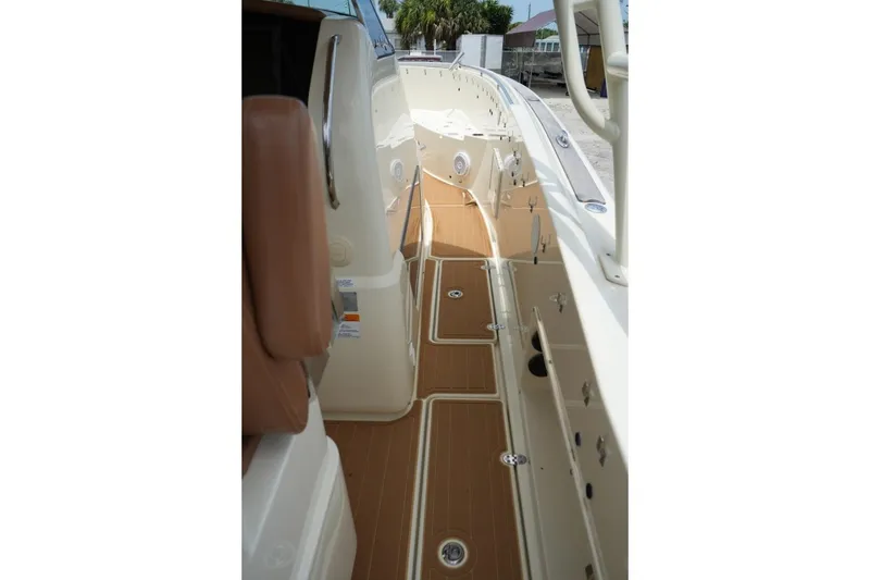 Slide: The Image of 2016 Chris-Craft Catalina 34 boat deck with teak flooring and sleek design. - 20