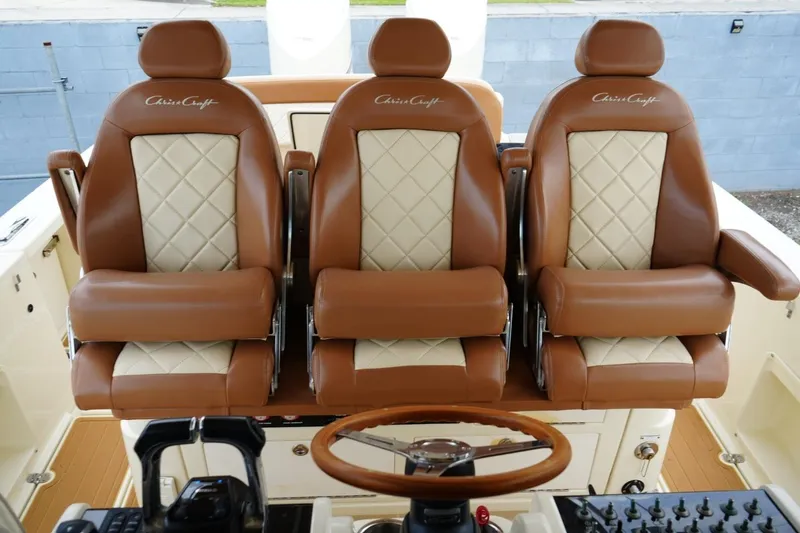 Slide: The Image of Luxurious leather seating on 2016 Chris-Craft Catalina 34 boat, featuring elegant design and craftsmanship. - 28
