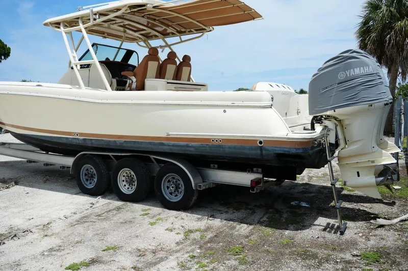 Slide: The Image of 2016 Chris-Craft Catalina 34 boat on trailer, featuring Yamaha engine cover. - 7