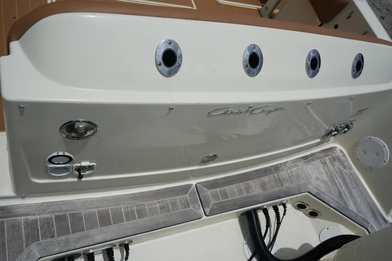 Slide: The Image of 2016 Chris-Craft Catalina 34 boat stern with teak flooring and chrome fittings. - 14