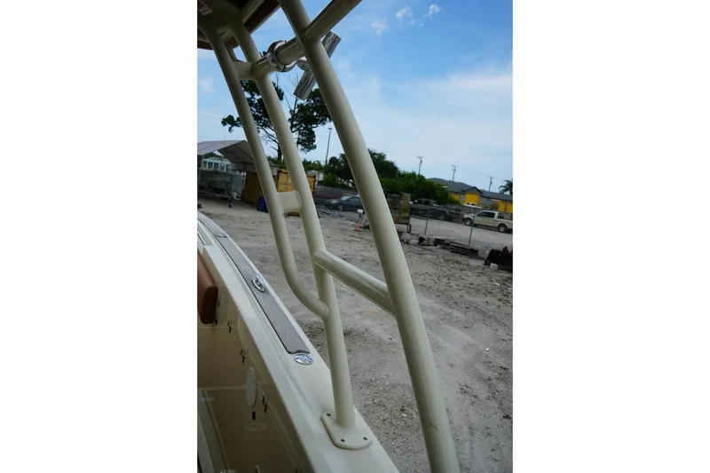 Slide: The Image of 2016 Chris-Craft Catalina 34 boat railing with outdoor background. - 43