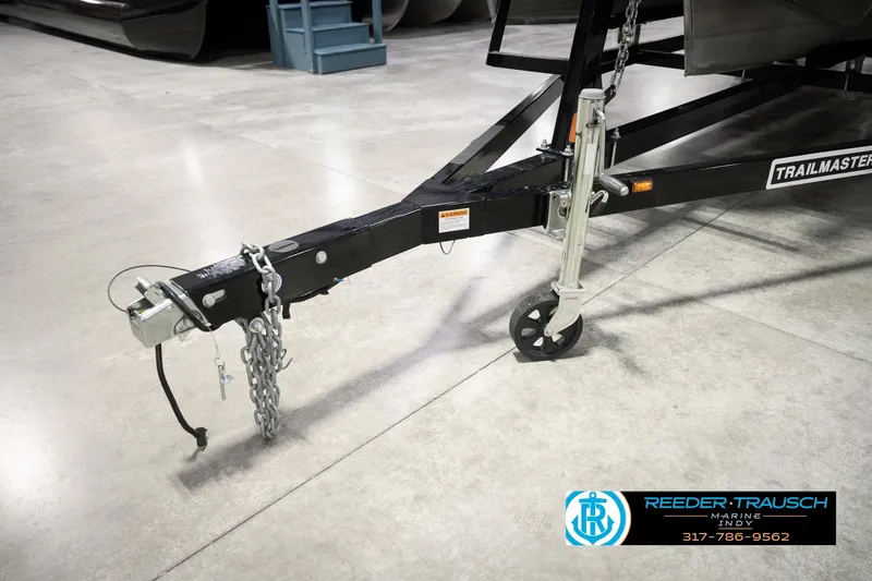 Slide: The Image of Trailer hitch of a 2018 Manitou 23 Oasis RF VP, featuring a Trailmaster frame. - 69