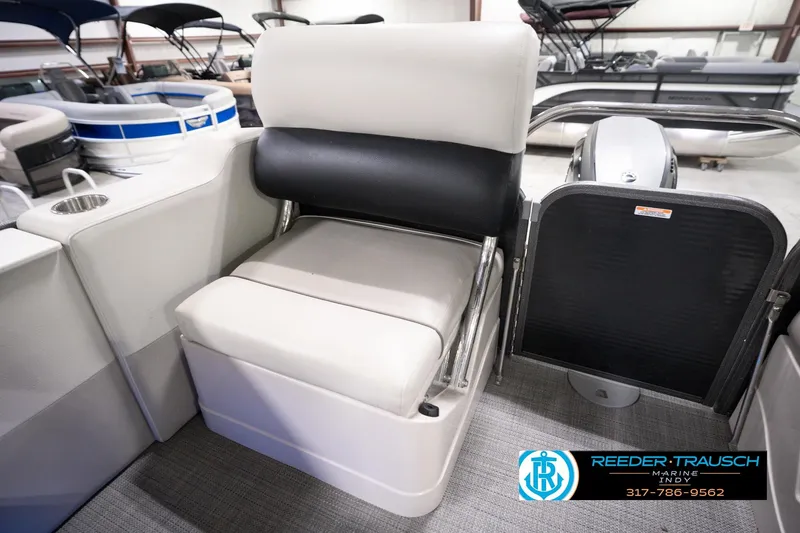 Slide: The Image of 2018 Manitou 23 Oasis RF VP boat seat with cup holder and gate. - 57
