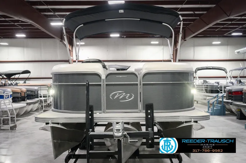 Slide: The Image of 2018 Manitou 23 Oasis RF VP pontoon boat in showroom, front view. - 4