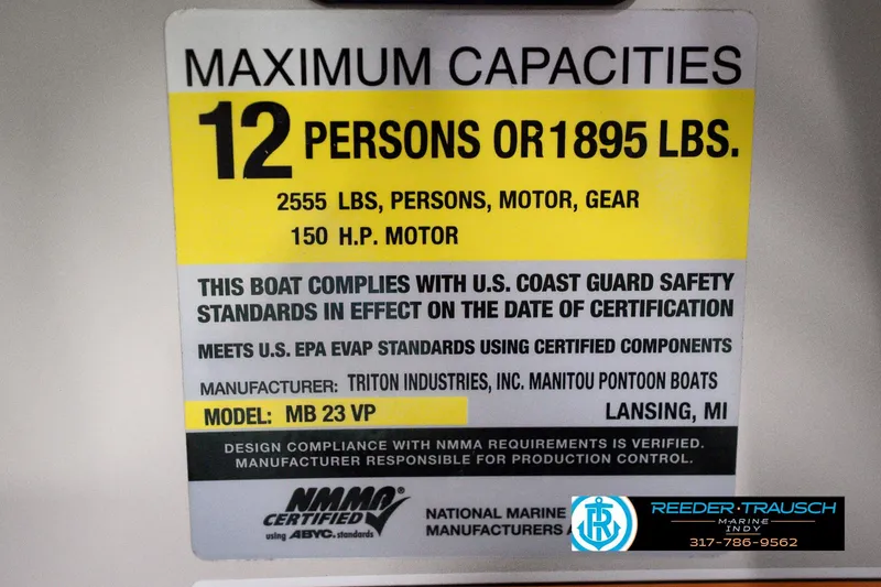 Slide: The Image of Capacity label for 2018 Manitou 23 Oasis RF VP, 12 persons or 1895 lbs. - 73