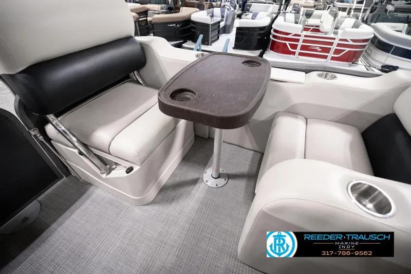 Slide: The Image of Luxurious seating area on a 2018 Manitou 23 Oasis RF VP pontoon boat. - 40