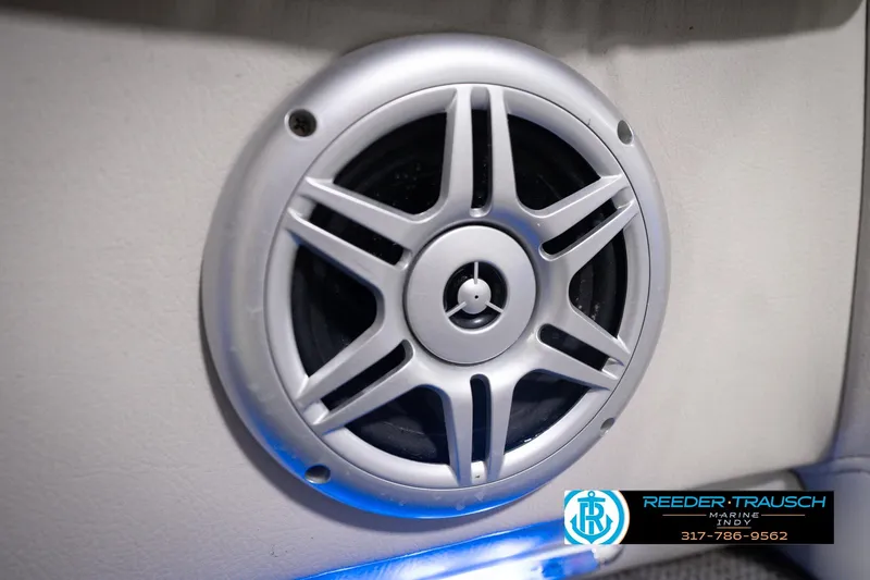 Slide: The Image of Close-up of a speaker on a 2018 Manitou 23 Oasis RF VP boat. - 59