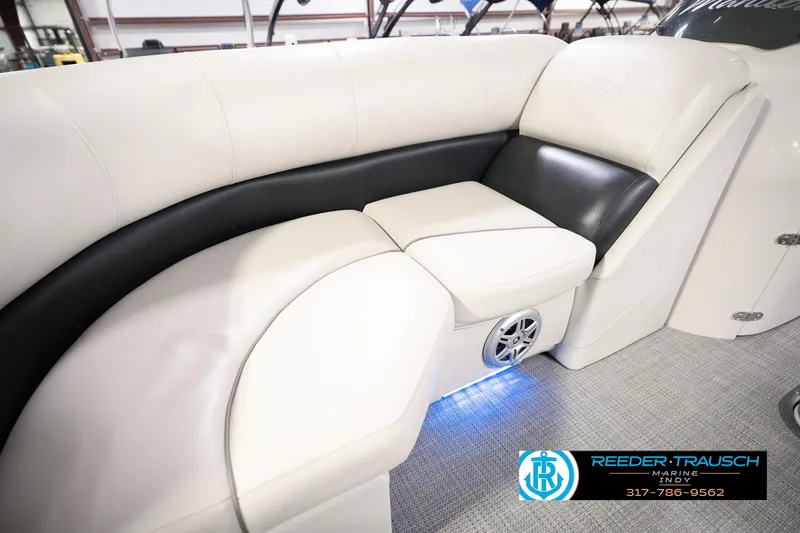 Slide: The Image of Luxurious seating on 2018 Manitou 23 Oasis RF VP boat with LED lighting. - 58