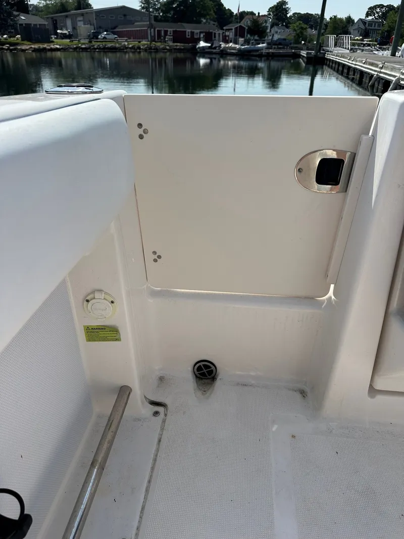 Slide: The Image of Interior view of a 2018 Robalo R227 Dual Console boat. - 17