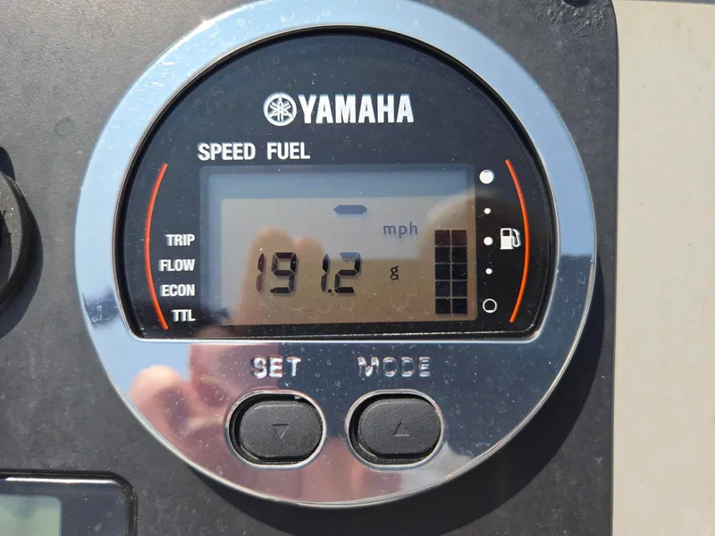 Slide: The Image of A Yamaha speed and fuel gauge displays 19.2 mph. - 34