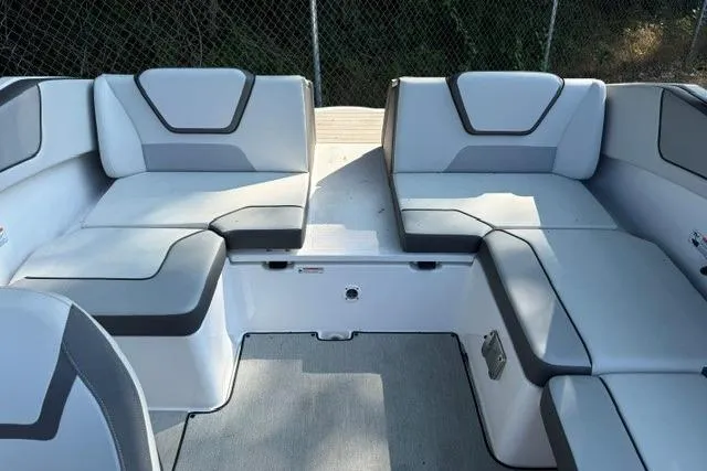 Slide: The Image of 2023 Yamaha Boats AR220 interior seating with modern design and comfortable upholstery. - 4