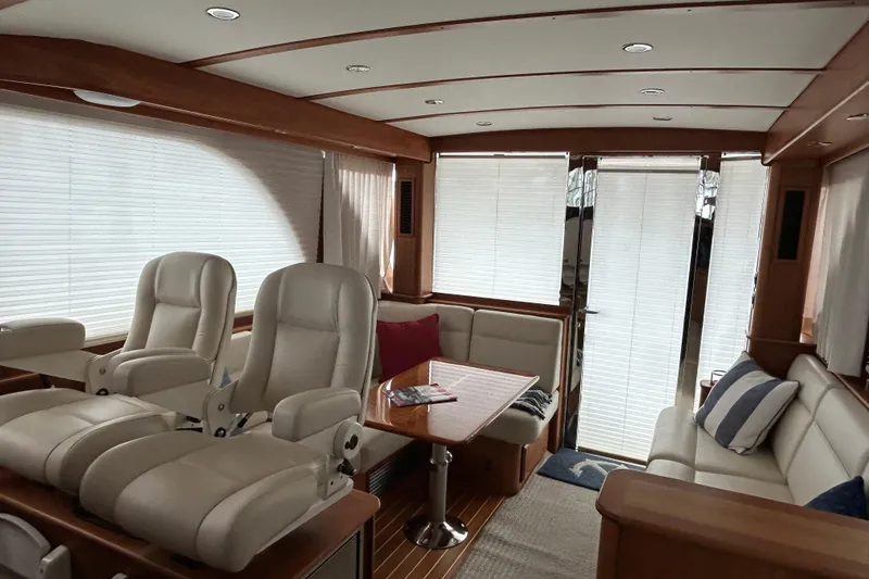 Slide: The Image of Luxurious interior of 2022 Sabre 45 Salon Express yacht with plush seating and elegant design. - 14