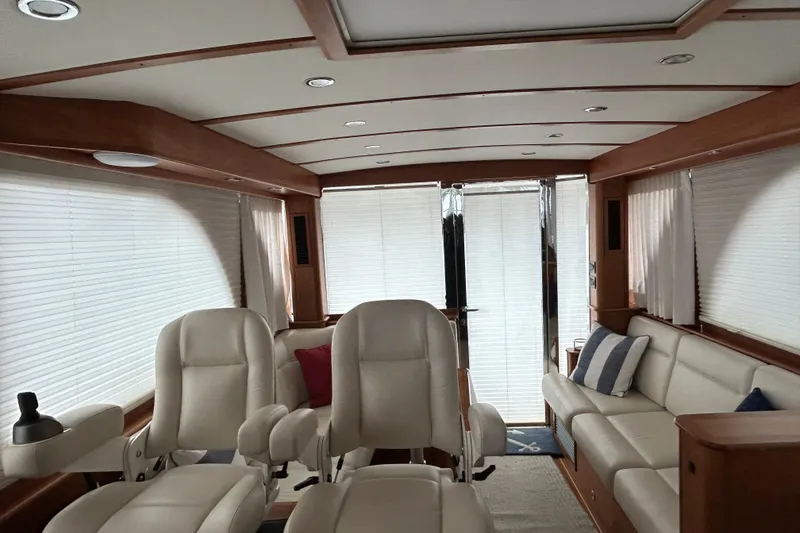 Slide: The Image of Luxurious interior of 2022 Sabre 45 Salon Express yacht with plush seating and elegant design. - 16