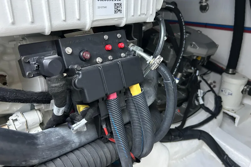 Slide: The Image of Engine compartment of 2022 Sabre 45 Salon Express, featuring wiring and components. - 44
