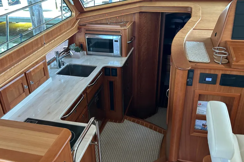 Slide: The Image of Luxurious interior of 2022 Sabre 45 Salon Express yacht with modern kitchen amenities. - 32