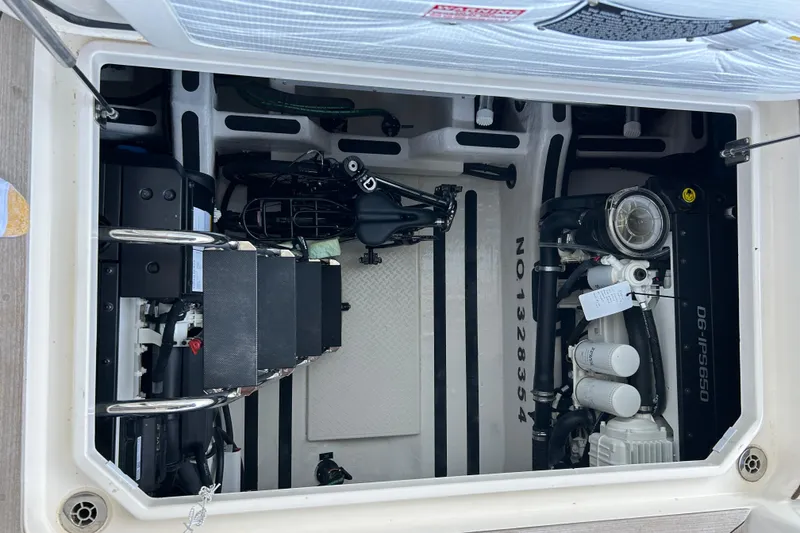 Slide: The Image of Engine compartment of 2022 Sabre 45 Salon Express, showcasing mechanical components and layout. - 50