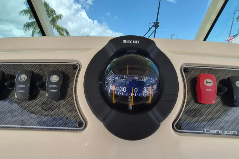 Slide: The Image of Close-up of a compass on a Grady-White Canyon 336 boat. - 15
