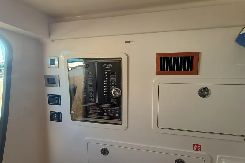 Slide: The Image of Interior view of a Grady-White Canyon 336 with control panel and ventilation. - 19