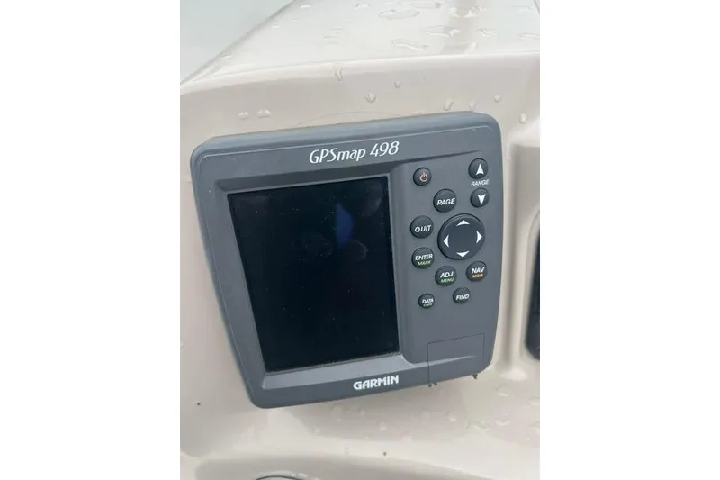 Slide: The Image of Garmin GPSmap 498 on 2006 Sea Ray 240 Sundancer boat dashboard. - 9